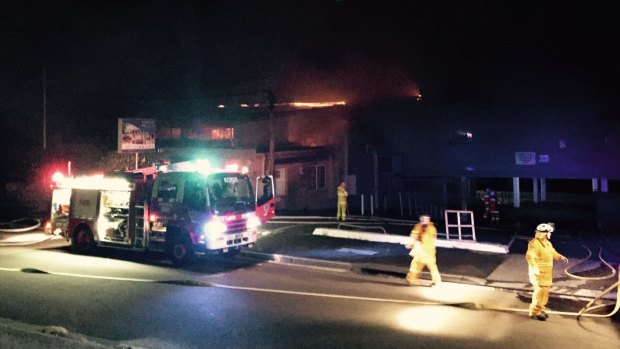 Gutted: Fire crews at the scene of the Bundeena RSL