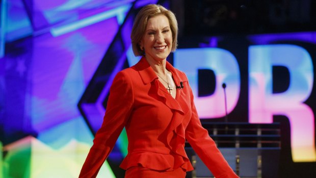 Carly Fiorina walks on stage at the start of the first Republican debate.