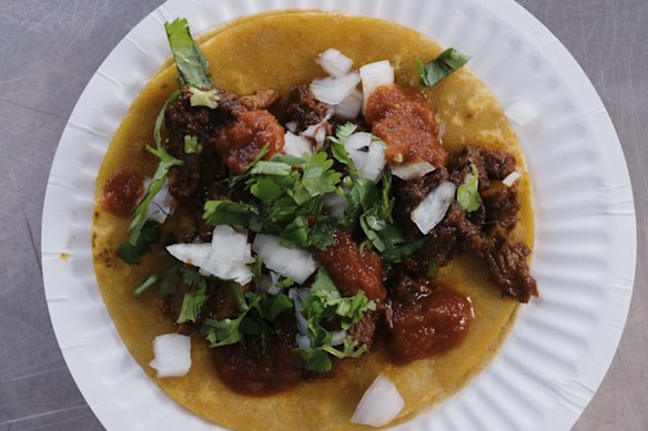 Chef Toby Wilson with his Taco pop-up van Ricos Tacos in Rosebery. Photographed Thursday 29th October 2020. Taco Beef Birria. Photograph by James Brickwood. SMH GOOD FOOD 201029