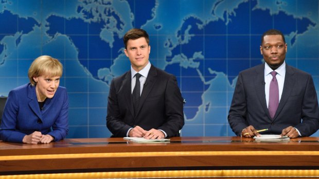 Colin Jost (centre) is an actor and head writer at Saturday Night Live. 