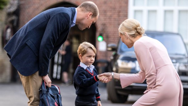 Prince George shakes the hand of Helen Haslem, head of the lower school last week.