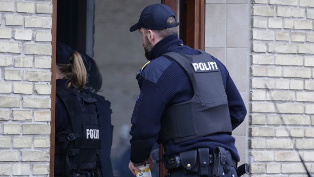 Danish Police search an apartment in Tingbjerg, Copenhagen, on Thursday.