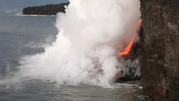 The collapse of solidified lava and sea cliff from Kilauea Volcano in 2005.