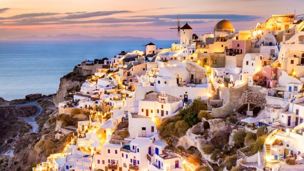 Sunset over Santorini but the sun never sets on Greece's friendliness and beauty.