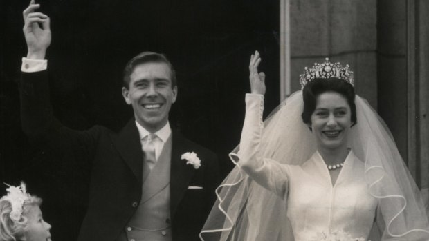 Princess Margaret and her bridegroom Antony Armstrong-Jones, also known as Lord Snowdon, as they wave from Buckingham Palace on May 6 1960.