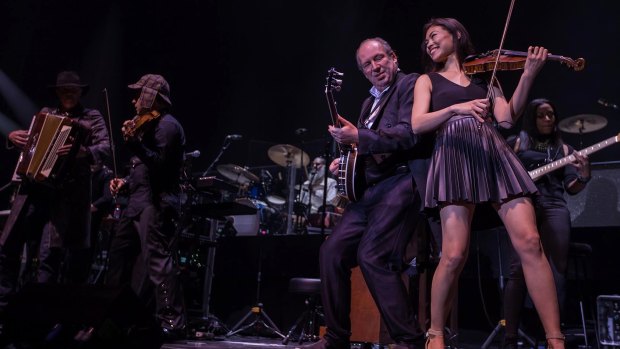 Movie composer and multi-instrumental musician Hans Zimmer, jamming on the banjo.