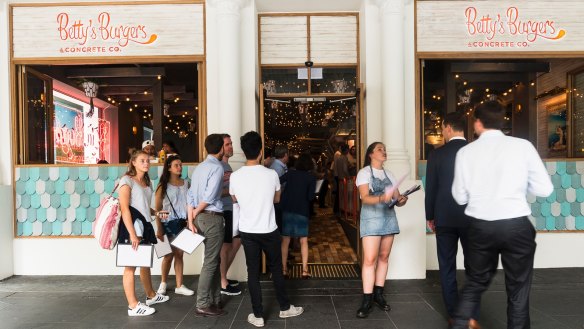 A queue forms outside Betty's Burgers, 97 Elizabeth Street, Melbourne.