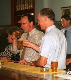 Wayne Goss and former Prime Minister Paul Keating have a beer at a Charleville pub in 1994.