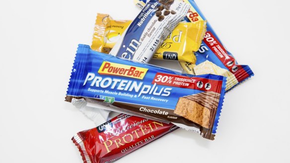 Istanbul,Turkey - February 12, 2013: Some different kinds of protein energy bars on white background. Protein bars are targeted to people who primarin Which healthy foods are making you fat? Nutritionists analyse low-fat yoghurt, dairy-free spreads, protein bars, breakfast drinks, smoothies and other products.