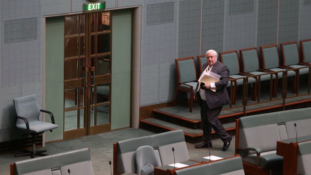 Clive Palmer exits the House of Representatives after announcing he will not recontest the seat of Fairfax.