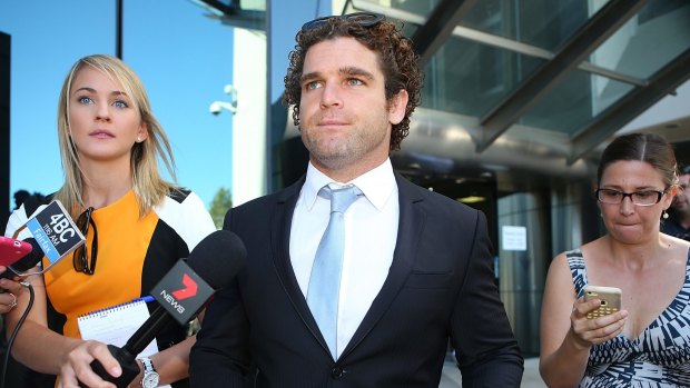 Gold Coast Titans player Beau Falloon leaves Southport Magistrates Court after appearing in March.