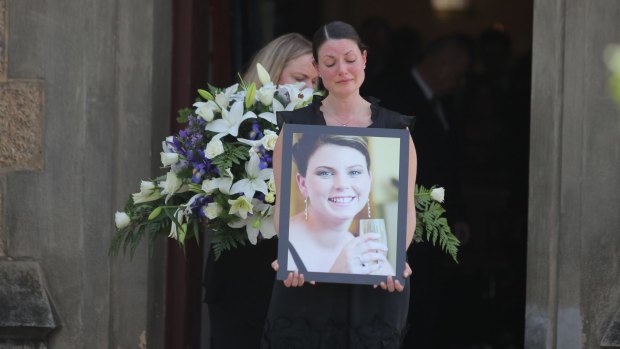 Mourners leave the Beechworth church where Andrea Lehane was farewelled, and where she married her husband, James, five years earlier.