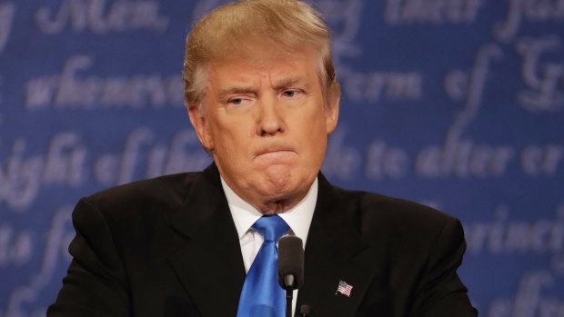 Donald Trump restrains himself during the debate.