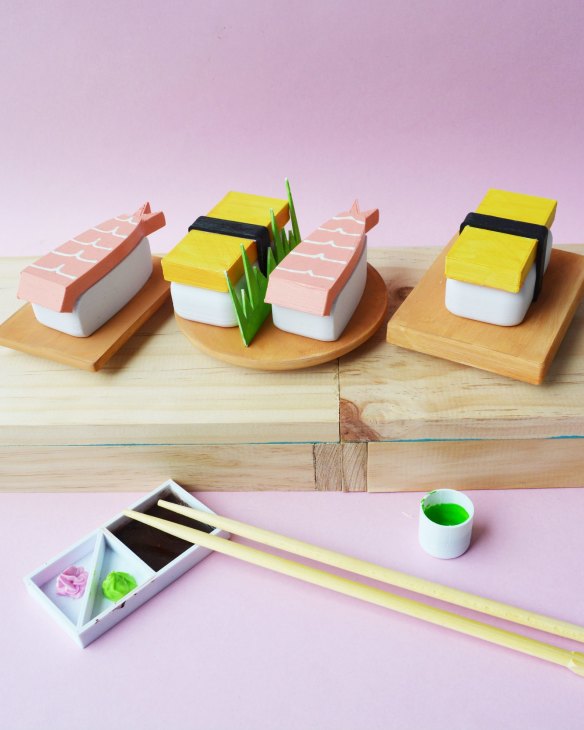 Handpainted mini sushi figurine bento set by MimaWorkshop, from $20, from Etsy, <a href="https://www.etsy.com/au/listing/462482634/japanese-bento-set-handpainted-sushi" target="_blank">etsy.com</a>.