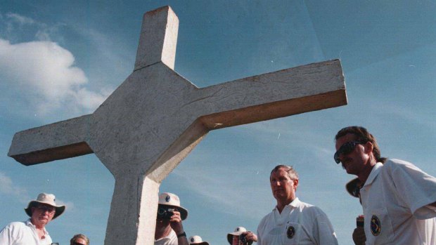 Vietnam veterans at the cross erected in memory of those who fell at the battle of Long Tan. 