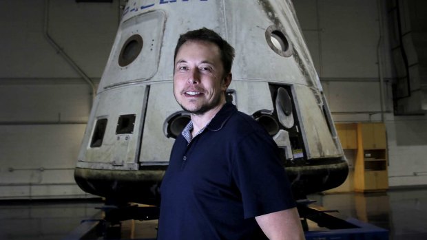 Elon Musk with his SpaceX Dragon capsule. The billionaire has named his soace rocket company's drone ships after sentient spacecraft in sci-fis by Iain M. Banks.
