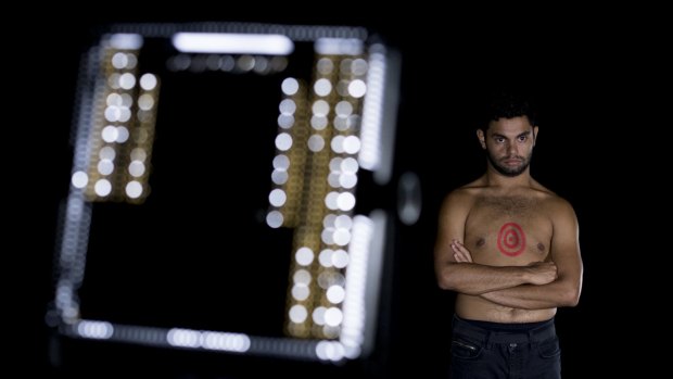 Bangarra dancer Beau Dean Riley Smith in Tony Albert and Stephen Page's video work <i>Moving Targets</i>.