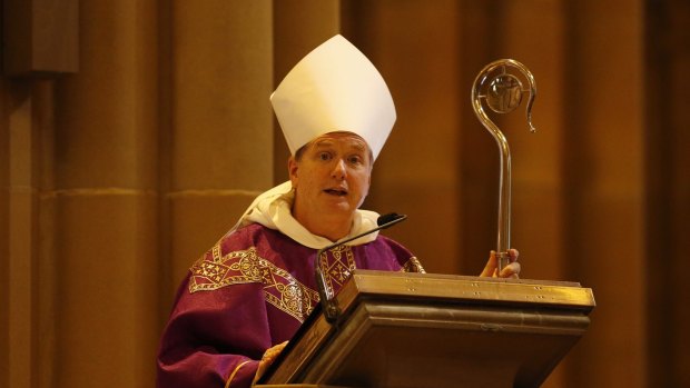 Archbishop of Sydney Anthony Fisher celebrates a mass to pay respect to the victims of the Martin Place siege.