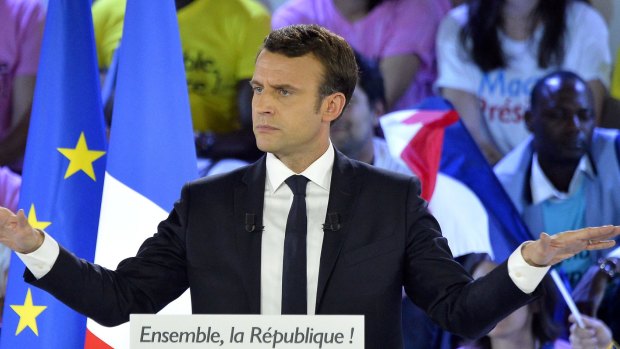 French Presidential Candidate Emmanuel Macron addresses voters during a political meeting at Grande Halle de La Villette in Paris.
