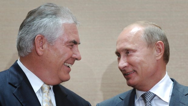 Exxon Mobil's chief executive, Rex Tillerson, with Putin. 