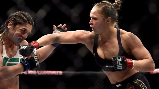 Breaking barriers:  Ronda Rousey in the ring. 