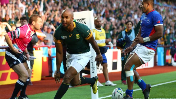 South Africa's JP Pietersen scores his team's second try during the rugby world cup match against Samoa.