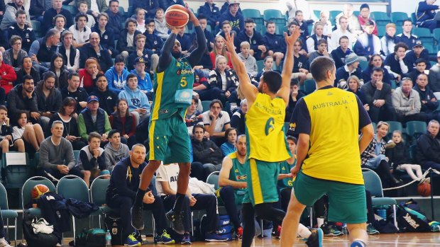 Sharpshooter: Patty Mills shoots during a 'Green and Gold' scrimmage game ahead of team selection for Rio in Melbourne.