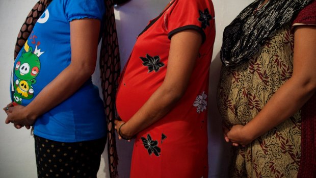 Families - and pregnant surrogates - are left in limbo when laws suddenly change.