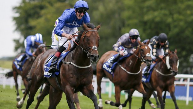 Maiden group 1 win: Adam Kirby steers Harry's Angel (left) to victory in The Darley July Cup Stakes at Newmarket.
