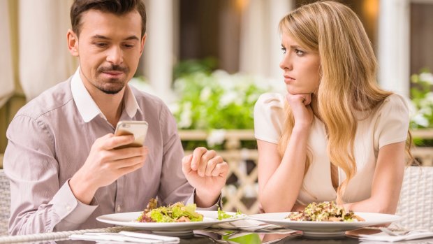 Should adults who can't stop looking at their phones be banned from restaurants too?