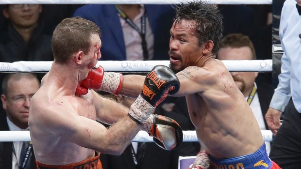 One of Manny Pacquiao's coaches has attacked the judges over a decision. 