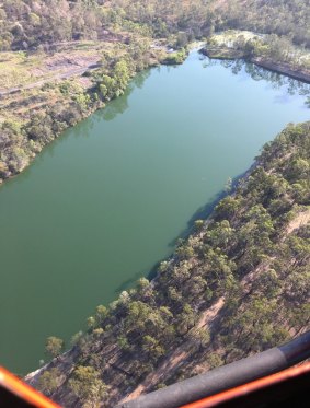 A search and rescue team will search Aqua Lake at the New Chum quarry for a missing 21-year-old swimmer.