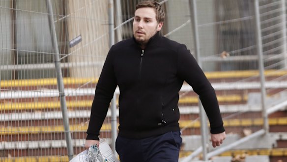 Former ATO deputy commissioner Michael Cranston is charged with improperly using his position to help his son, Adam (pictured), who has been charged with tax fraud.