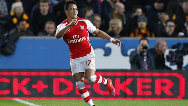 Crowd favourite: Alexis Sanchez celebrates the opener.