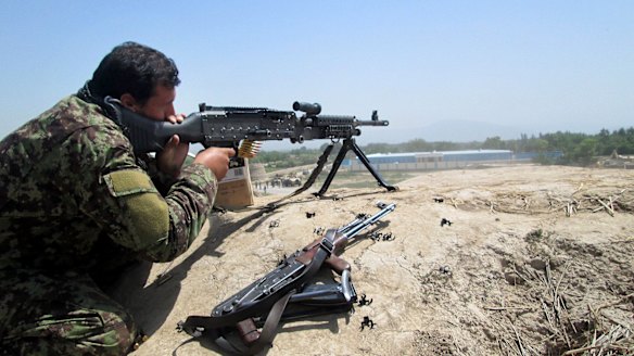 An Afghan soldier in the Chahardara district of Kunduz province last week.