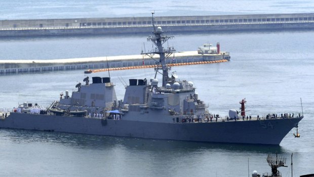 The USS Curtis Wilbur deliberately sailed near one of the Beijing-controlled islands in the hotly contested South China Sea. 