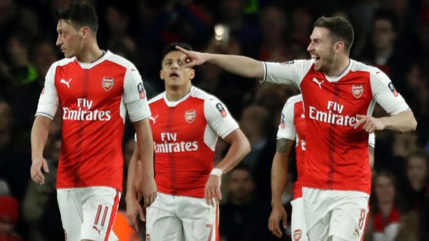 Five for the good: Arsenal crushed Lincoln City to progress to the FA Cup semis.