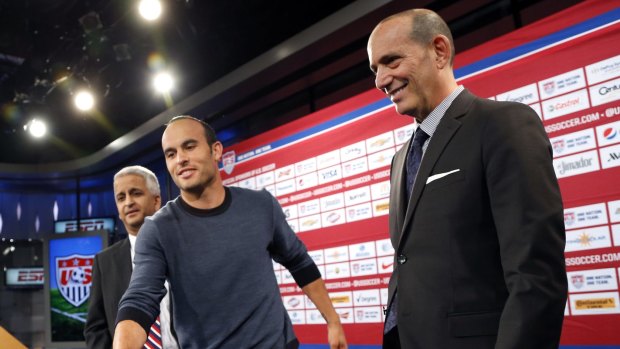 Don Garber, right, hit back at Klinsmann and attacked him about the World Cup omission of Landon Donovan, middle.