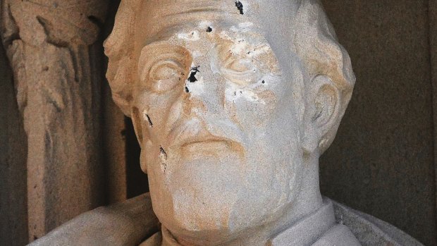 A defaced General Robert E. Lee statue stands at the Duke Chapel in Durham, North Carolina. 
