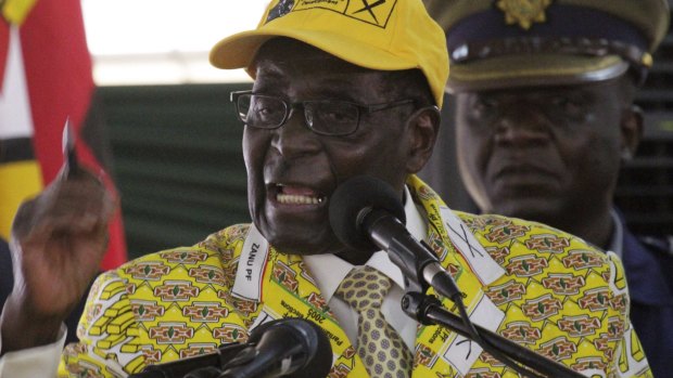 Strongman: Zimbabwean President Robert Mugabe has purged a slew of ministers.
