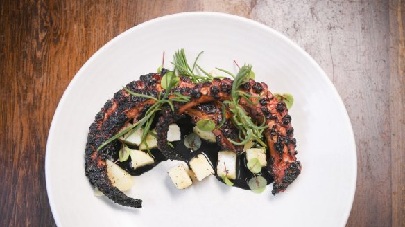 Barbecued octopus, squid ink custard, confit potato and sea spray.