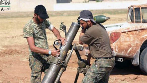 Rebel fighters from Ahrar al-Sham prepare an attack on Islamic State in Aleppo.