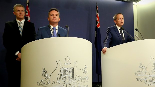 Opposition Leader Bill Shorten during a joint press conference with shadow treasurer Chris Bowen and finance spokesman Tony Burke on Friday. 