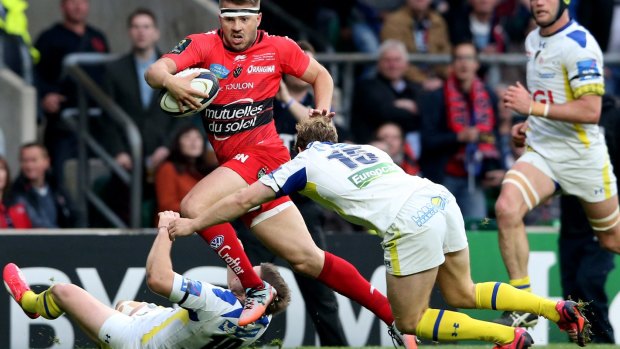 Drew Mitchell of Toulon evades the tackle form Nick Abendanon of Clermont.