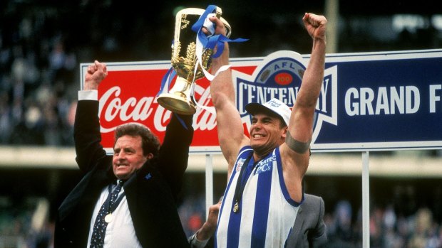 Denis Pagan and Wayne Carey hold the 1996 premiership cup aloft.