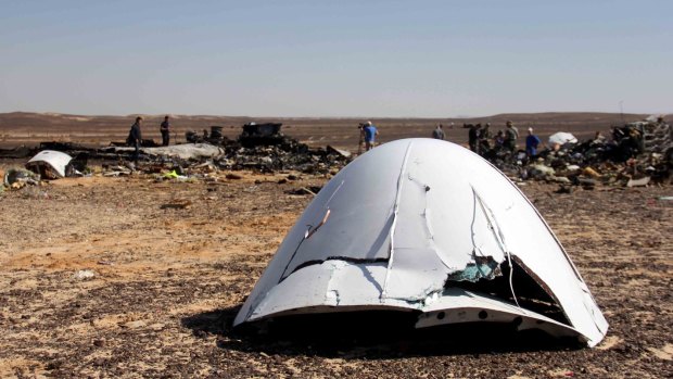 Debris of a Russian airplane is seen at the site a day after the passenger jet bound for Russia crashed in Egypt.