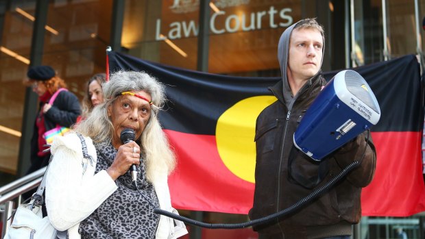 Aboriginal tent embassy leader Jenny Munro delivers a speech outside the Supreme Court before Friday's hearing.