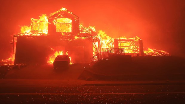 A home burns in Santa Rosa, California, on Monday.