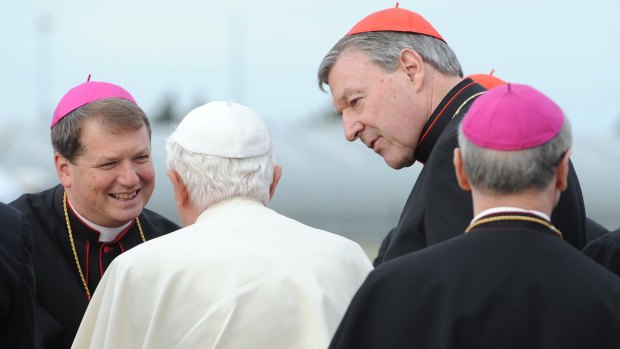 Bishop Anthony Fisher  and Cardinal George Pell greet Pope Benedict in Sydney in 2008. 