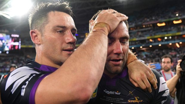 Old firm: Cooper Cronk enjoys the moment with Cameron Smith.